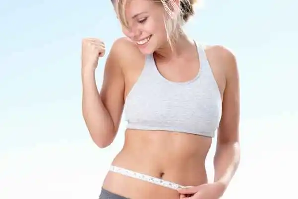 woman happy after fat reduction treatment Salisbury