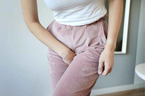 older woman running to the toilet because of urinary incontinence Salisbury